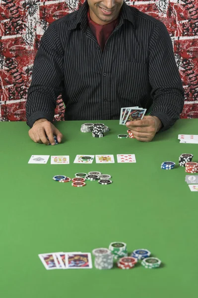 Man at a casino table — Stock Photo, Image