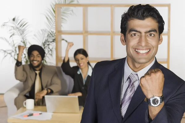 Business executives showing fist — Stock Photo, Image