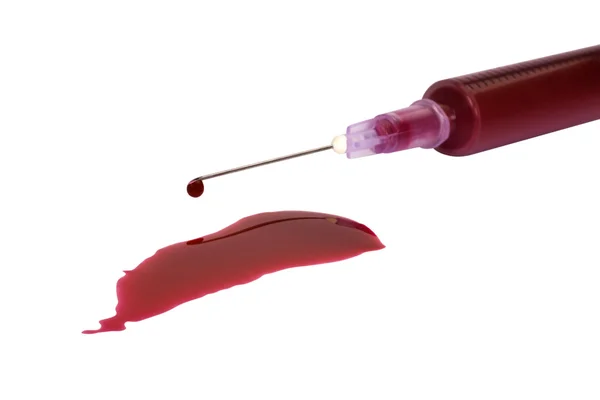 Bloed met een injectiespuit — Stockfoto