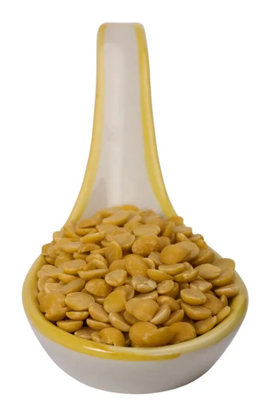 Close-up of pigeon peas in a spoon — Stock Photo, Image