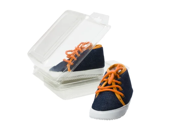 Close-up of a pair of canvas shoes with an open shoe box — Stock Photo, Image