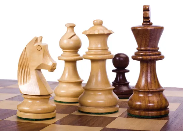 Σκακιστικά κομμάτια σε μια σκακιέρα — Φωτογραφία Αρχείου