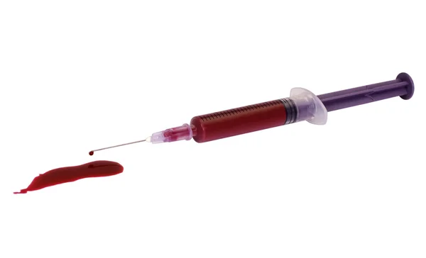 Bloed met een injectiespuit — Stockfoto