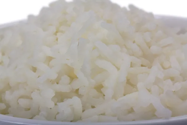 Close-up de uma tigela cheia de arroz cozido — Fotografia de Stock