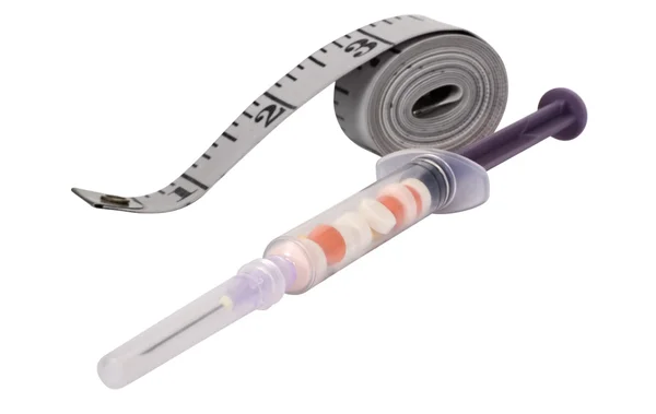 Medical injection with a tape measure — Stock Photo, Image