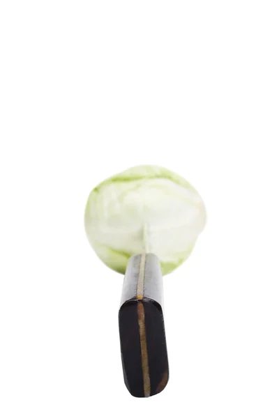 Close-up of a knife cutting a cabbage — Stock Photo, Image