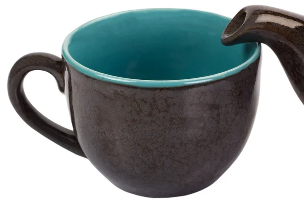 Primo piano di un bollitore per tè con una tazza di tè — Foto Stock