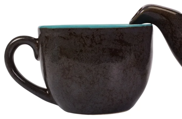 Primo piano di un bollitore per tè con una tazza di tè — Foto Stock