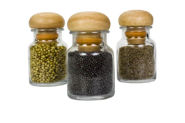 Tre beholdere med forskellige krydderier - Stock-foto
