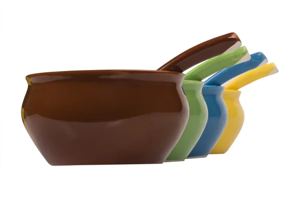 Close-up of ceramic bowls and soup spoons — Stock Photo, Image