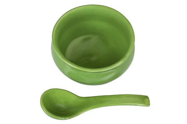 Primo piano di una ciotola di ceramica con un cucchiaio da minestra — Foto Stock
