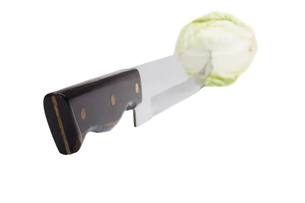 Close-up of a knife cutting a cabbage — Stock Photo, Image