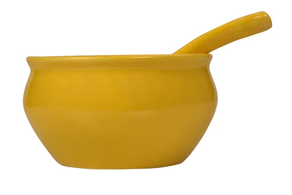 Крупный план керамической миски с ложкой для супа — стоковое фото
