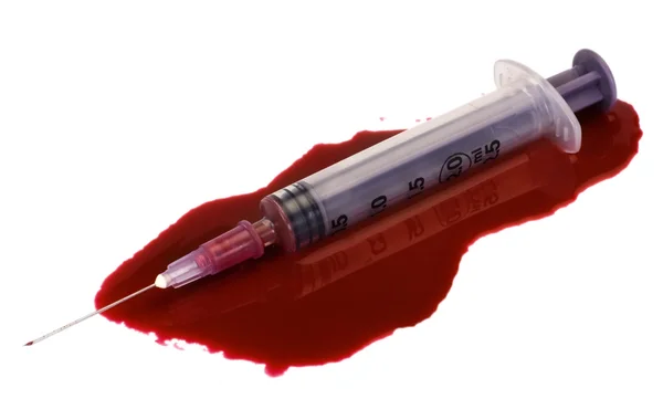 Blodet med en spruta — Stockfoto