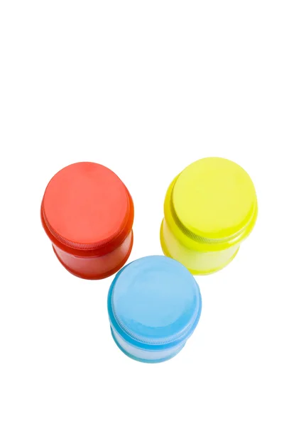 High angle view of colorful plastic jars — Stock Photo, Image