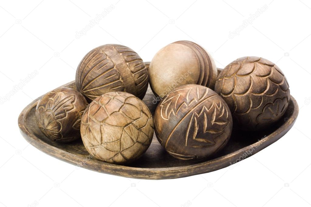 Closeup of decorative wooden balls on a tray — Stock Photo © imagedb