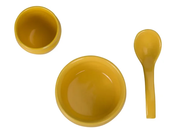 Primo piano di ciotole di ceramica e un cucchiaio di minestra — Foto Stock