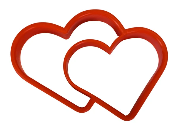 Közeli kép: a szív alakú süti vágó — Stock Fotó