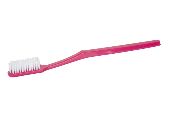Gros plan sur une brosse à dents rose — Photo
