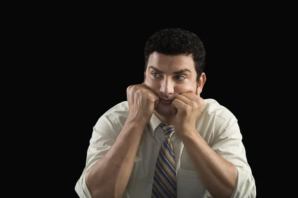 Businessman waiting with his head in hands — Stock Photo, Image