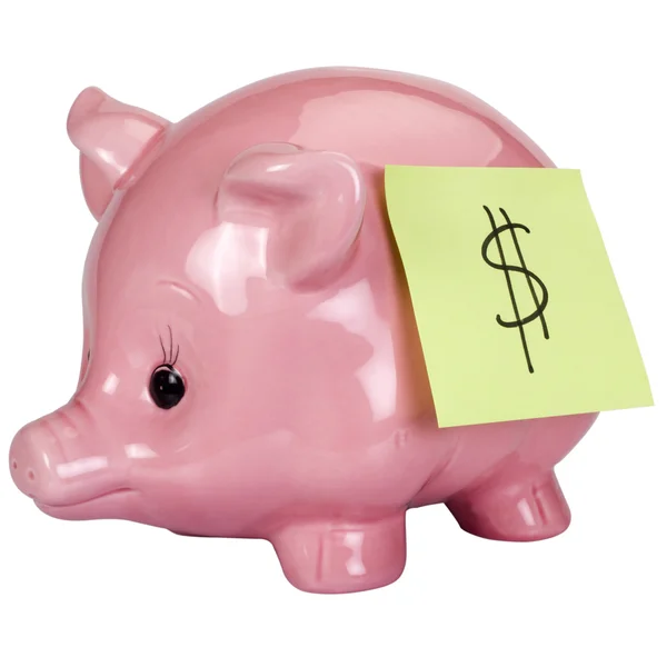 Dollar sign adhesive note stuck on a piggy bank — Stock Photo, Image