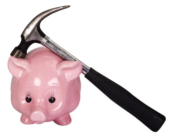 Nahaufnahme eines Sparschweins mit einem Hammer darauf — Stockfoto