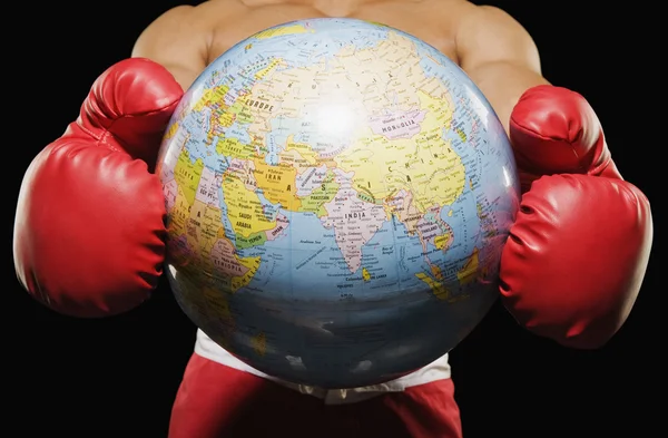 Boxer tenendo globo — Foto Stock