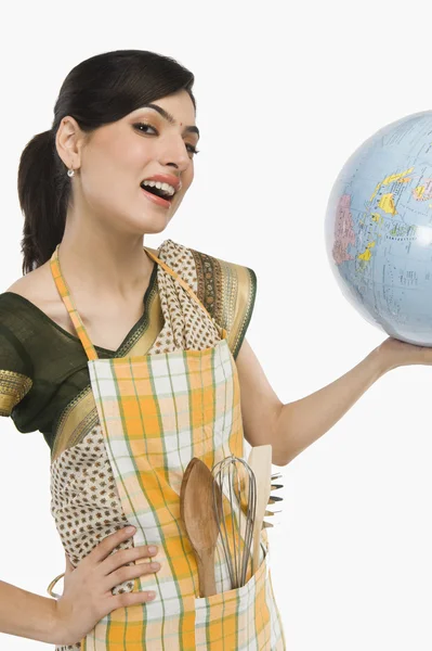 Woman holding a globe — Stock Photo, Image