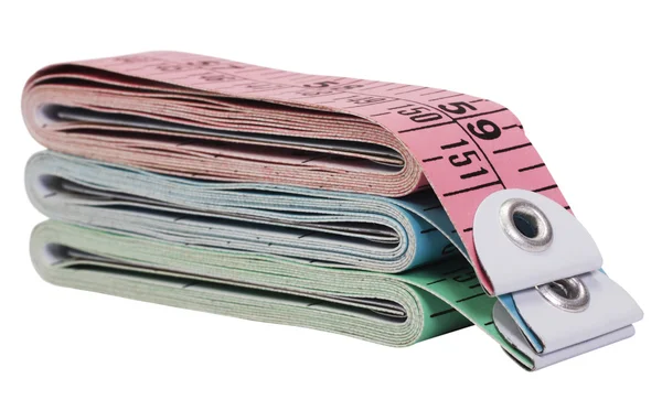 Close-up of a stack of tape measures — Stock Photo, Image