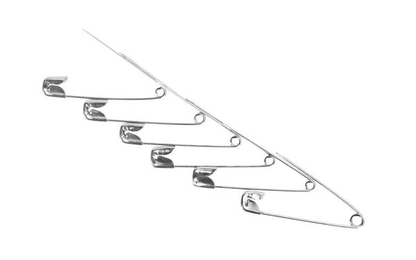 Close-up of safety pins in a row — Stock Photo, Image