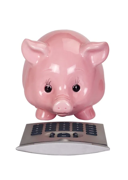 Bliska piggy bank kalkulator — Zdjęcie stockowe