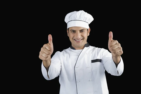 Retrato de un chef haciendo gestos con los pulgares hacia arriba —  Fotos de Stock