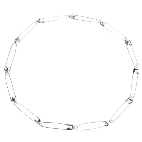 Circle made of safety pins — Stock Photo, Image