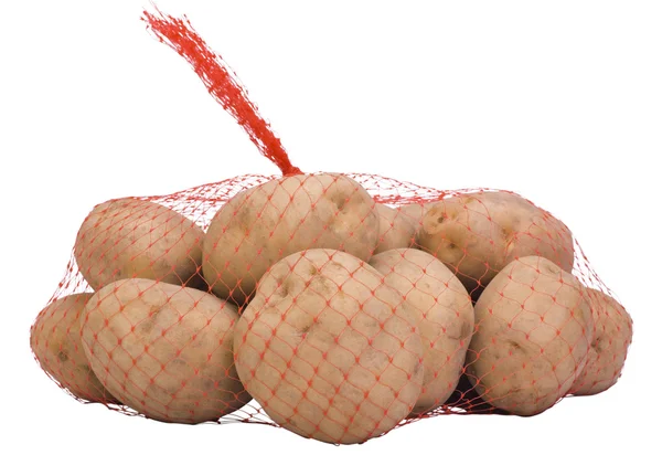 Zbliżenie: surowe ziemniaki worek netto — Zdjęcie stockowe