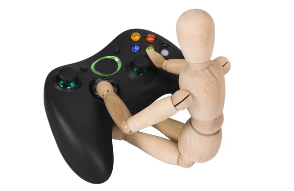 Artist's figure with a video game controller — Stock Photo, Image