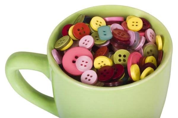 Primer plano de una taza llena de botones — Foto de Stock
