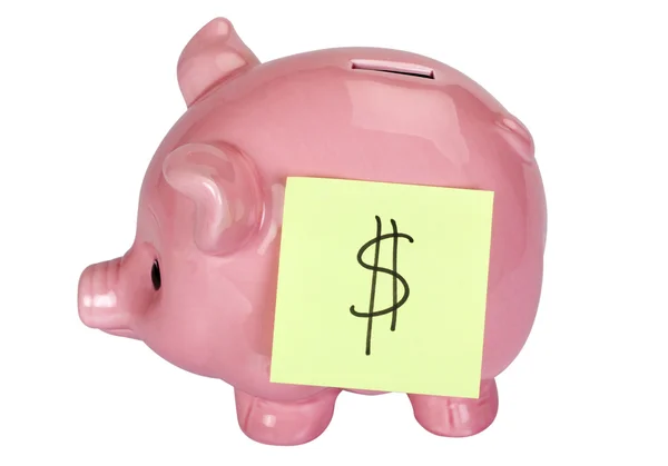 Znak dolara Uwaga samoprzylepne naklejane na piggy bank — Zdjęcie stockowe