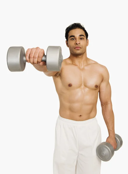 Man exercising with dumbbells — Stock Photo, Image