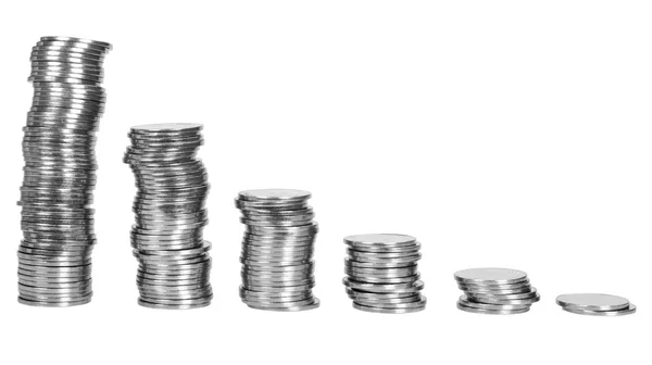 Travar av mynt i fallande ordning — Stockfoto