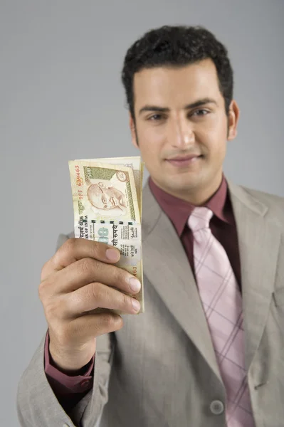 Businessman holding Indian five hundred rupee banknotes — Stock Photo, Image