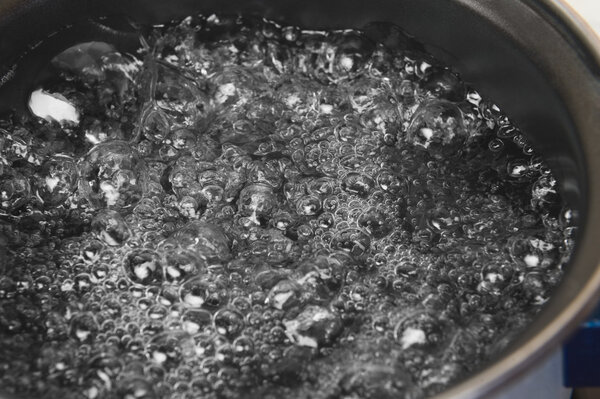 Boiling water in a pot
