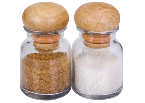 Dos frascos de azúcar y azúcar morena — Foto de Stock