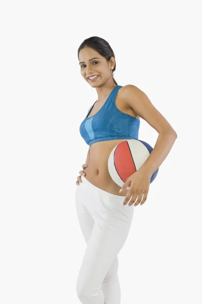 Woman holding a volleyball — Stock Photo, Image