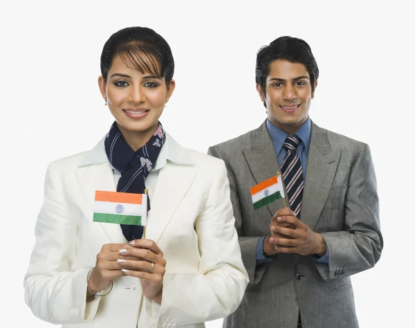 Business executives holding Indian flags — Stock Photo, Image