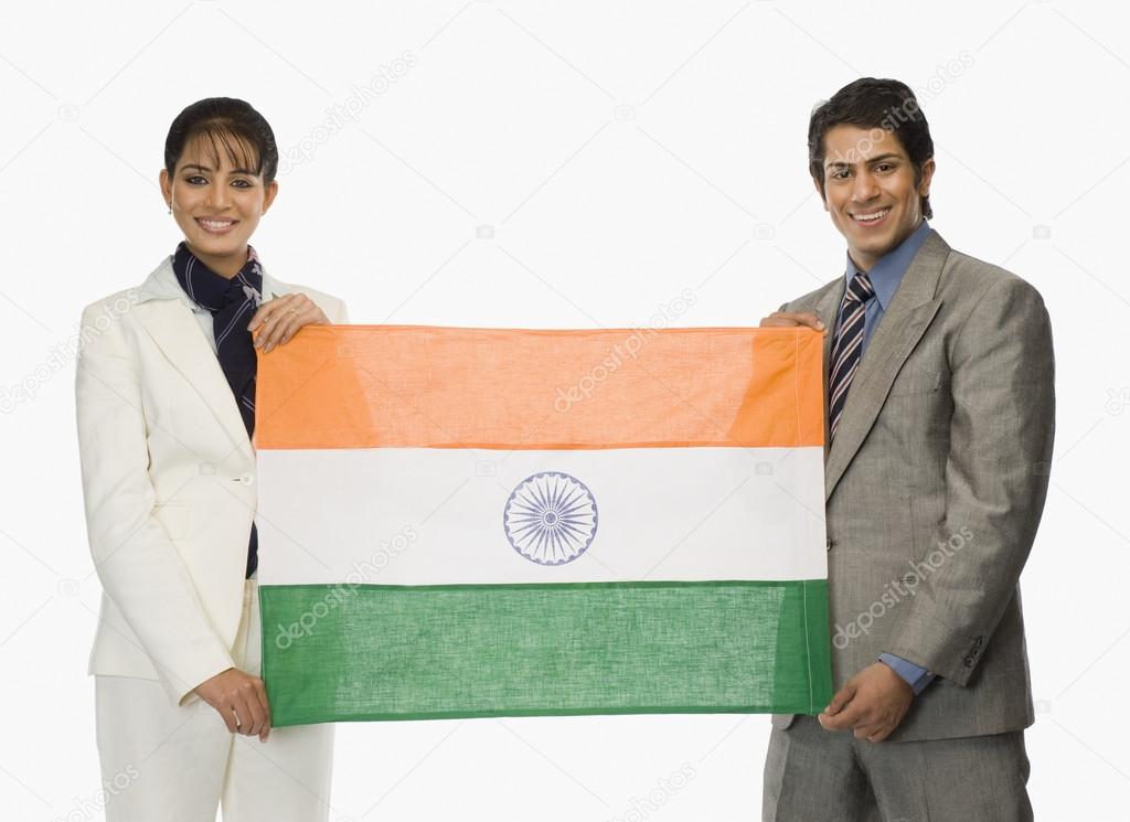 Business executives holding an Indian flag