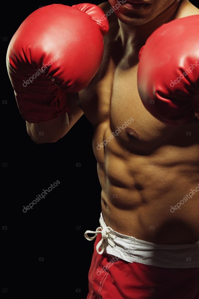 Male boxer in fighting stance — Stock Photo © imagedb_seller 33005803