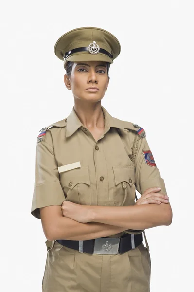 Police officer with her arms crossed — Stock Photo, Image