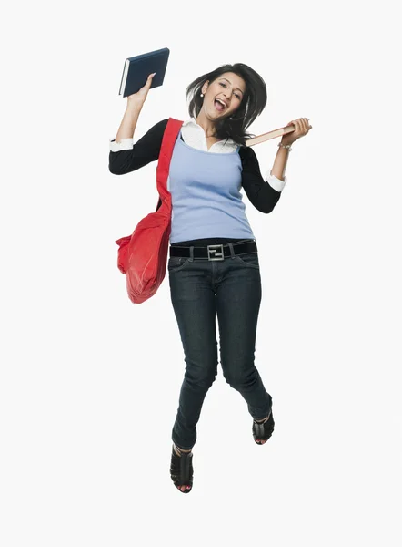 Student holding books — Stock Photo, Image