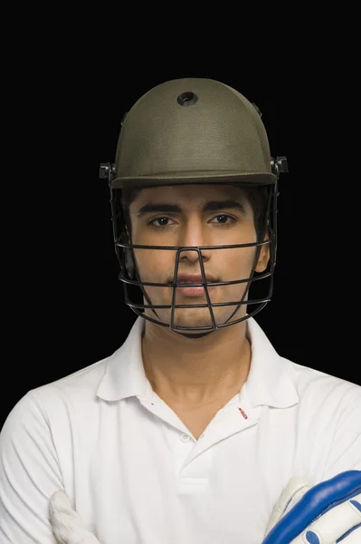 Batedor de críquete usando um capacete de críquete — Fotografia de Stock