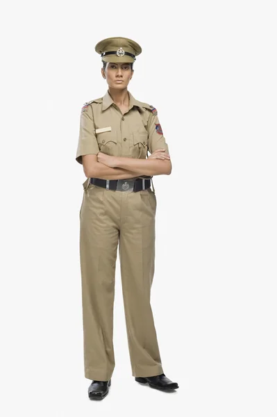 Police officer with her arms crossed — Stock Photo, Image